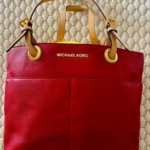 MK leather red bag.